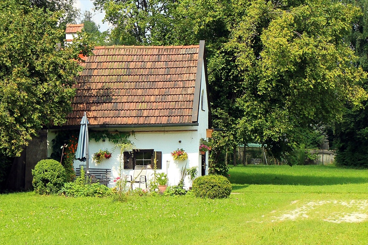 Een tuinhuis op maat voor een sfeervolle plek in uw tuin